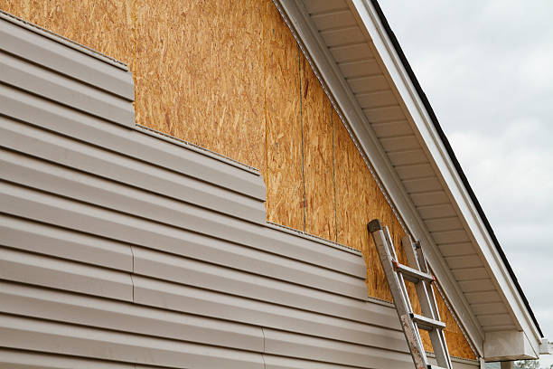 Professional Emergency Siding Repair technician working in Wallingford, CT